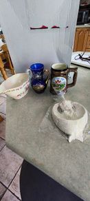3 ITMEMS OF POTTERY-  1- Angel White Resin Holy Water Font - 6 Inchs 22.00 EURO. 2- Vintage Cotfer 5 inchs Swiss Alps Lucerne Beer Stein 35.00 euro. 3- Vintage Wedgwood-Harmony Rose- Sauce Boat 18.00 euro.