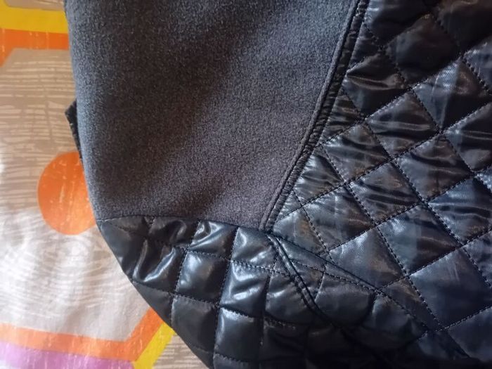 ladies jacket. Padded design. Black with grey material. Size small