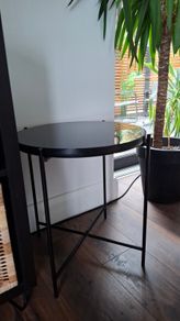 Black glass top side table