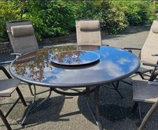 Garden furniture round table and 5 chairs.