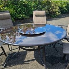 Garden furniture round table and 5 chairs.