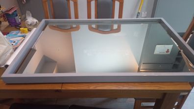 Large heavy steel mirror