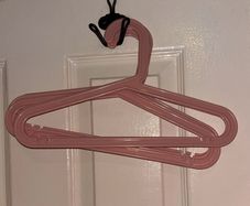 10 pink baby hangers