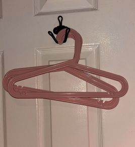 10 pink baby hangers