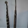 Charming Giraffe and Elephant Pair Image 3