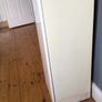 Tall white storage unit with drawer Image 3