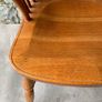 A large oak Windsor armchair. Image 7