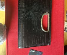black clutch bag with silver strap. Croc effect
