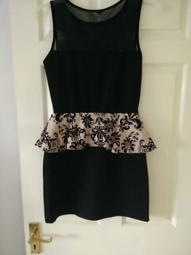 Evita brand Black Dress with Cream Design Peplum