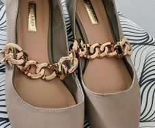 Beige ballet flats with gold chain size 7
