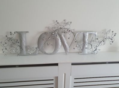 Metal "LOVE" wall art