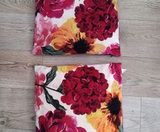 2 floral print cushions