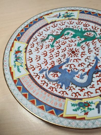 Vintage chinese porcelain plate with dragons decoration hand painted