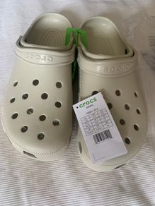 Brand new Crocs size 12 in original packaging never been worn ivory colour
