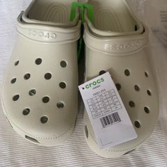 Brand new Crocs size 12 in original packaging never been worn ivory colour