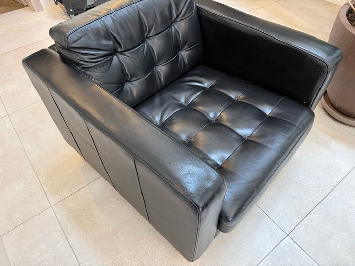 Black Leather Armchair and Matching Ottoman Footstool