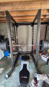 BODY IMAGE Power cage/Squat rack with Olympic bar bumper plates and adjustable bench