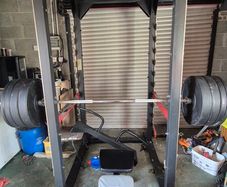 BODY IMAGE Power cage/Squat rack with Olympic bar bumper plates and adjustable bench