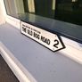 the old bog road cast iron sign Image 2