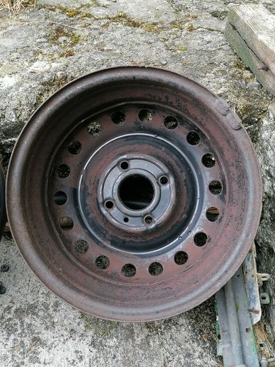 2 x steel rims 15", 4 stud, about 114mm ish from hole centre to the opposite home centre... Possibly fit a nissan etc