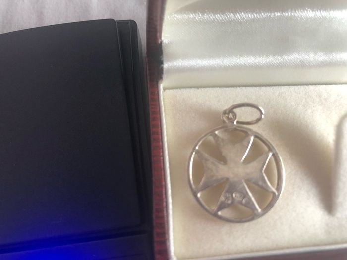 4 silver pendents