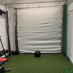 Golf - Hitting cage with impact screen and net around with it ..