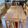 Solid oak dining room table Image 2