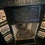 Cast iron fireplace with floral tiles Image 5