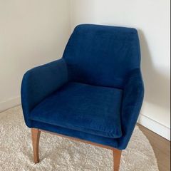 Blue velvet armchair
