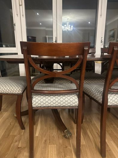 Extendable mahogany dining table and 8 Reprodux chairs