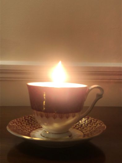 Vintage tea cup and saucer candle