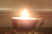 Vintage tea cup and saucer candle
