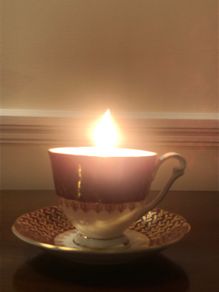 Vintage tea cup and saucer candle