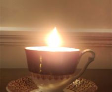 Vintage tea cup and saucer candle