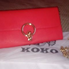 Koko Orange Clutch Bag