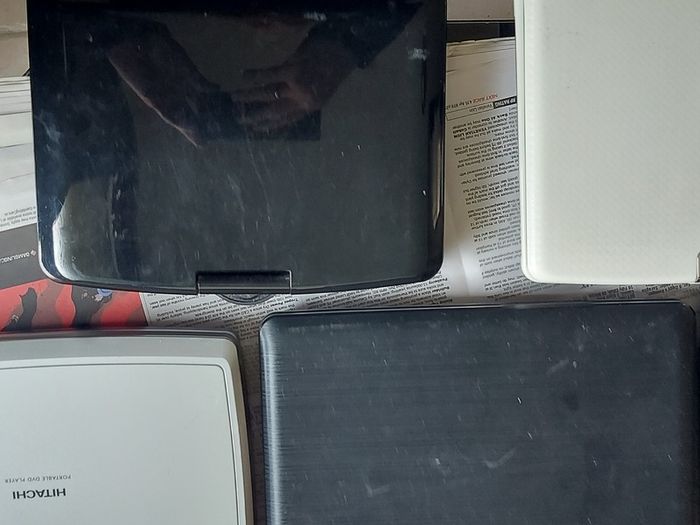 5 Portable DVD Players, all working, but no charges for them, all in very good condition