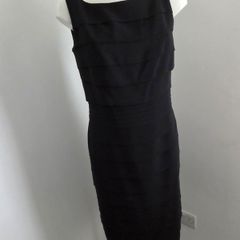 Never Worn. Size 10 Fully lined tiered black dress from Debut.