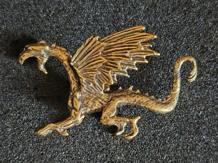 4 brass dragons.