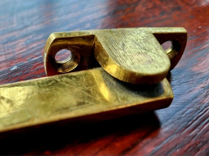 Vintage brass window stays
