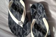 ladies flip flops Michael korrs size 4