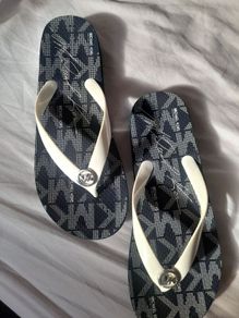 ladies flip flops Michael korrs size 4