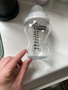 2 glass baby bottles