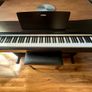 Yamaha Arius YDP-142 Digital Piano with rosewood finish and matching stool Image 2
