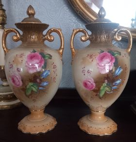 Pair of Edwardian lidded vases.