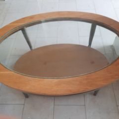 Oval wooden coffee table with glass top