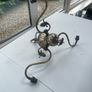 Vintage 3 arm brass chandelier with grapevine decoration. Image 3