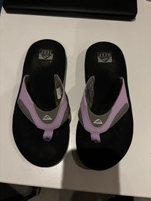 Reef Fanning flip flops