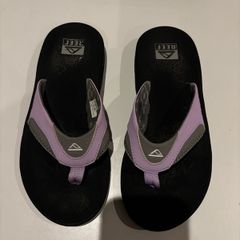 Reef Fanning flip flops