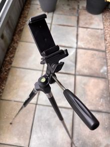 Lightweight tripod for phone or camera, with remote