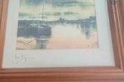 signed print of sea side.